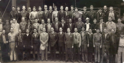 Our founder Earle M. Jorgensen pictured holding his popular white hat with the Los Angeles/Lynwood crew during the forties.